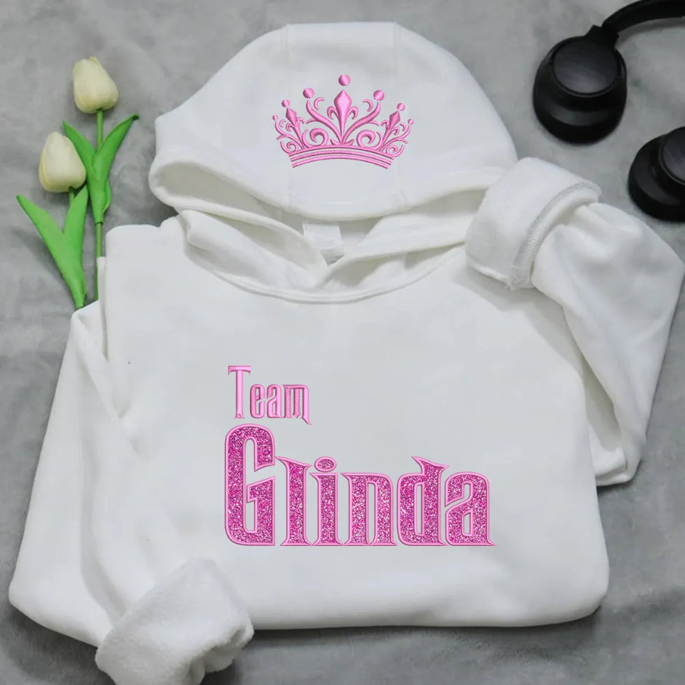 Team Glinda White Hoodie Pink Glitter Crown & Text Embroidered Pullover