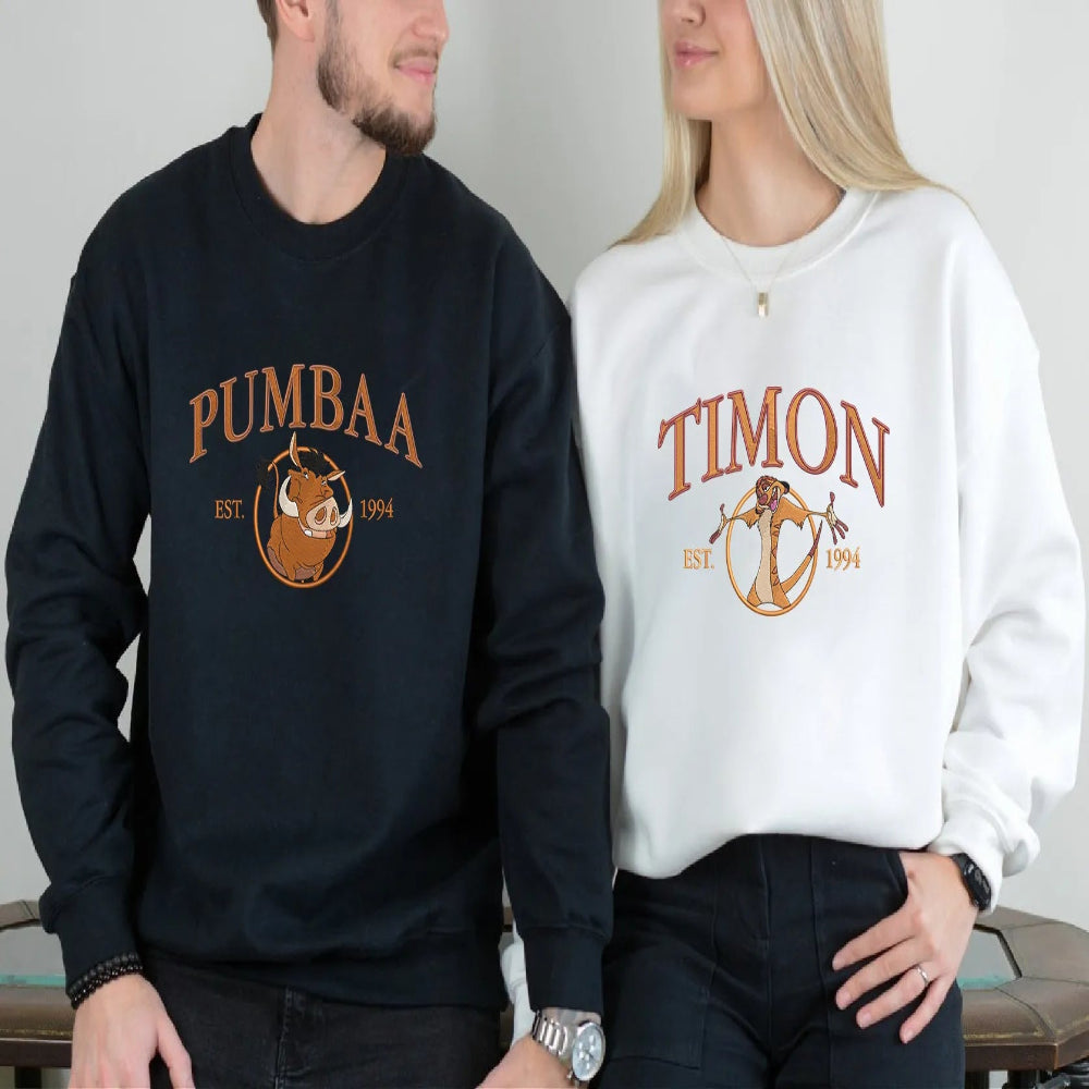 Couple Wearing Pumbaa And Timon Embroidered Lion King Sweatshirts