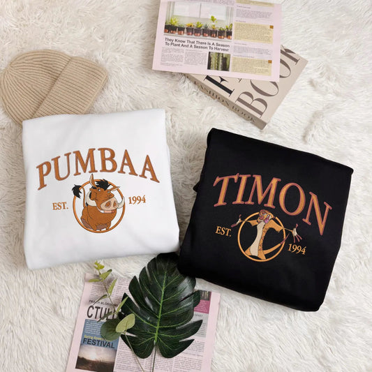 White, Black Sweatshirts With Pumbaa, Timon Circle Designs Est 1994