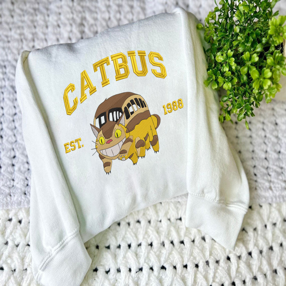 White Catbus 1988 Embroidered Crewneck On Crochet Blanket