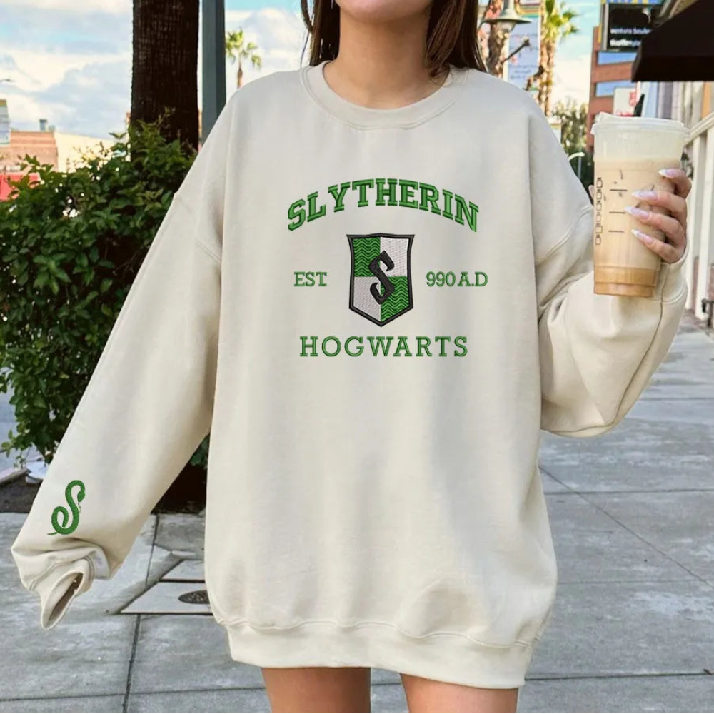 Woman Wearing Sand Slytherin Embroidered Sweatshirt In Outdoor Setting