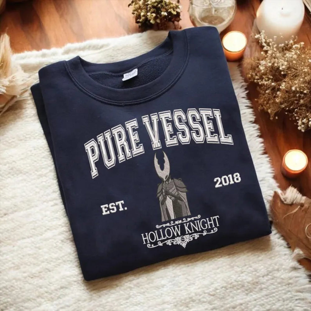 Navy Pure Vessel Embroidered Sweatshirt Folded, Hollow Knight Inspired Detail
