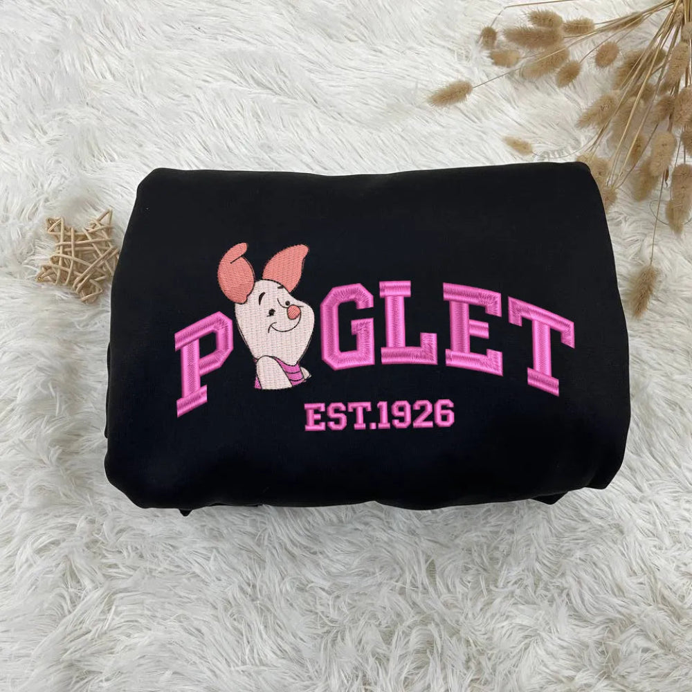 Folded Black Piglet Embroidered Sweatshirt With Pink Varsity Lettering
