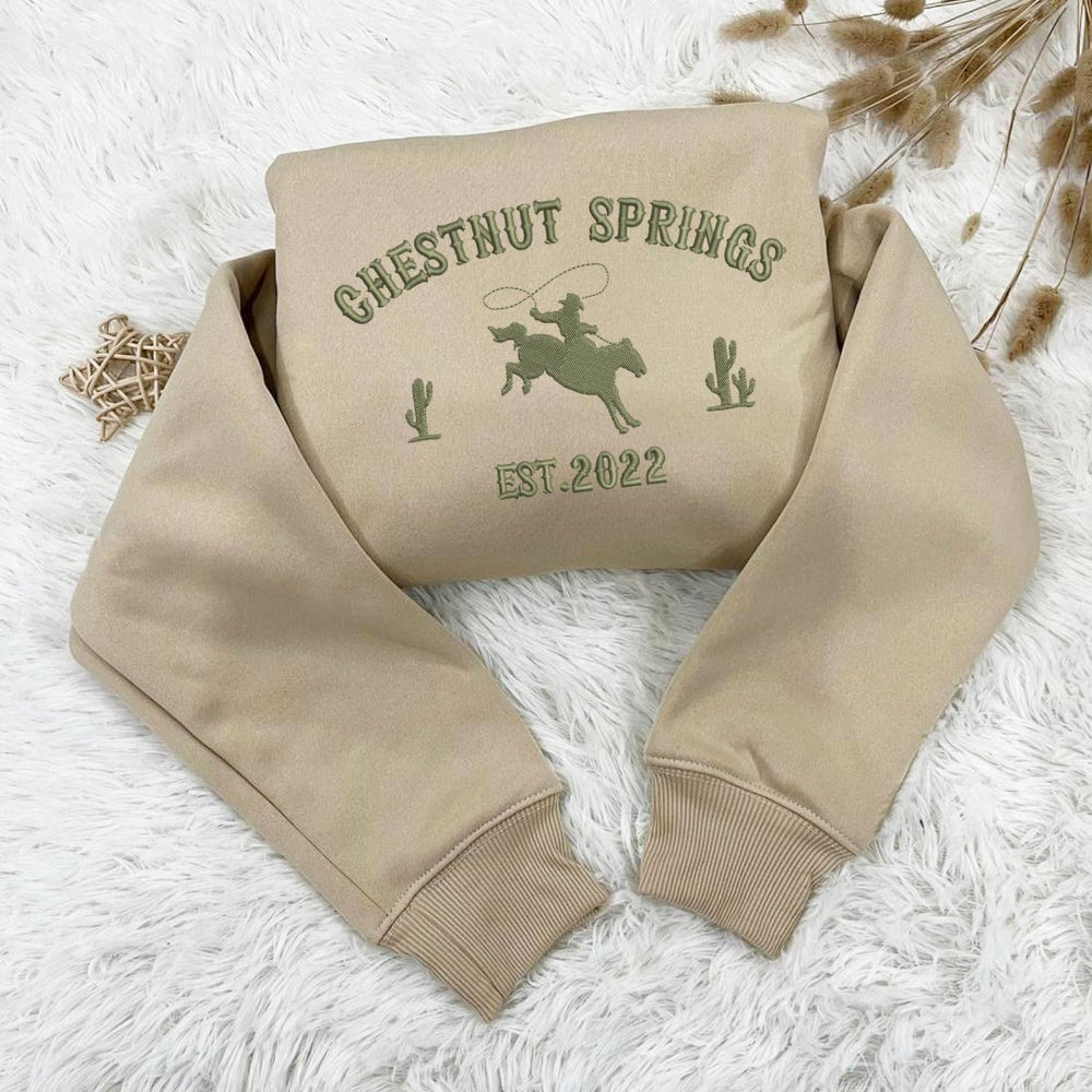 Sand Chestnut Springs Cowboy Embroidery On White Fur Blanket