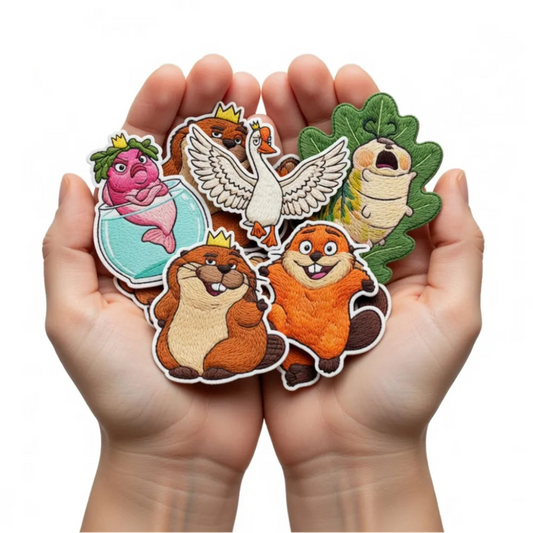 Pair Of Hands Holding Five Adorable Whimsical Animal Patches

