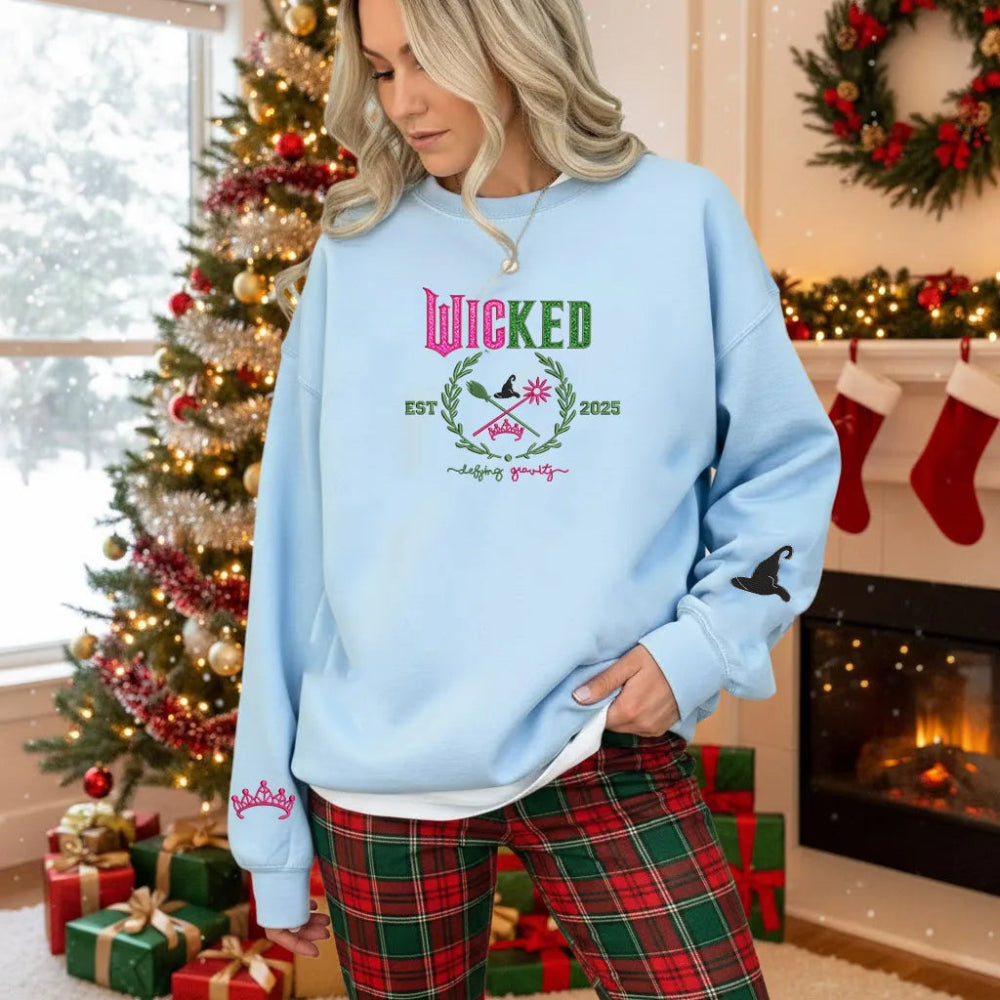 Light Blue Wicked Crewneck, Glittery Shiz Crest.
