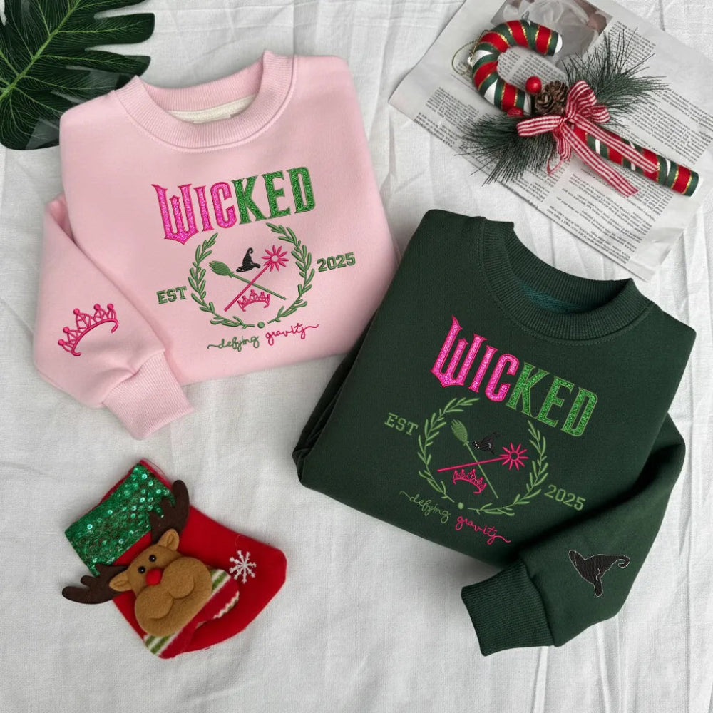 Pink Wicked Defying Gravity Embroidered Sweatshirt, Cozy Must-Have.
