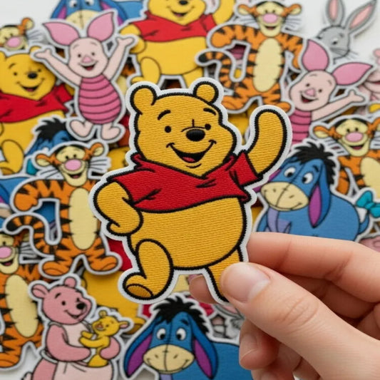 Hand Holding Adorable Winnie The Pooh Patch Waving With Shirt
