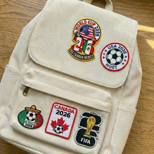 Beige Backpack Decorated With Multiple World Cup 2026 Host Patches